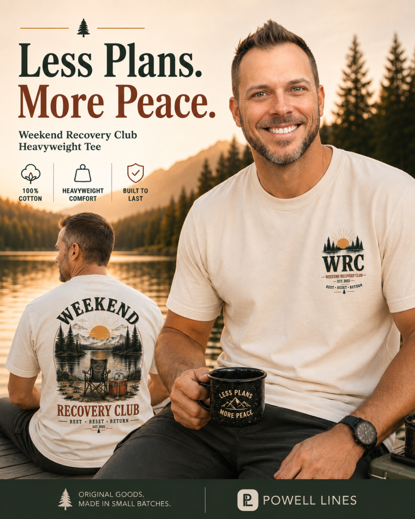 Man wearing the Weekend Recovery Club heavyweight graphic tee beside a peaceful lake.